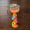 pomaranczowa przyssawka squigz.jpg